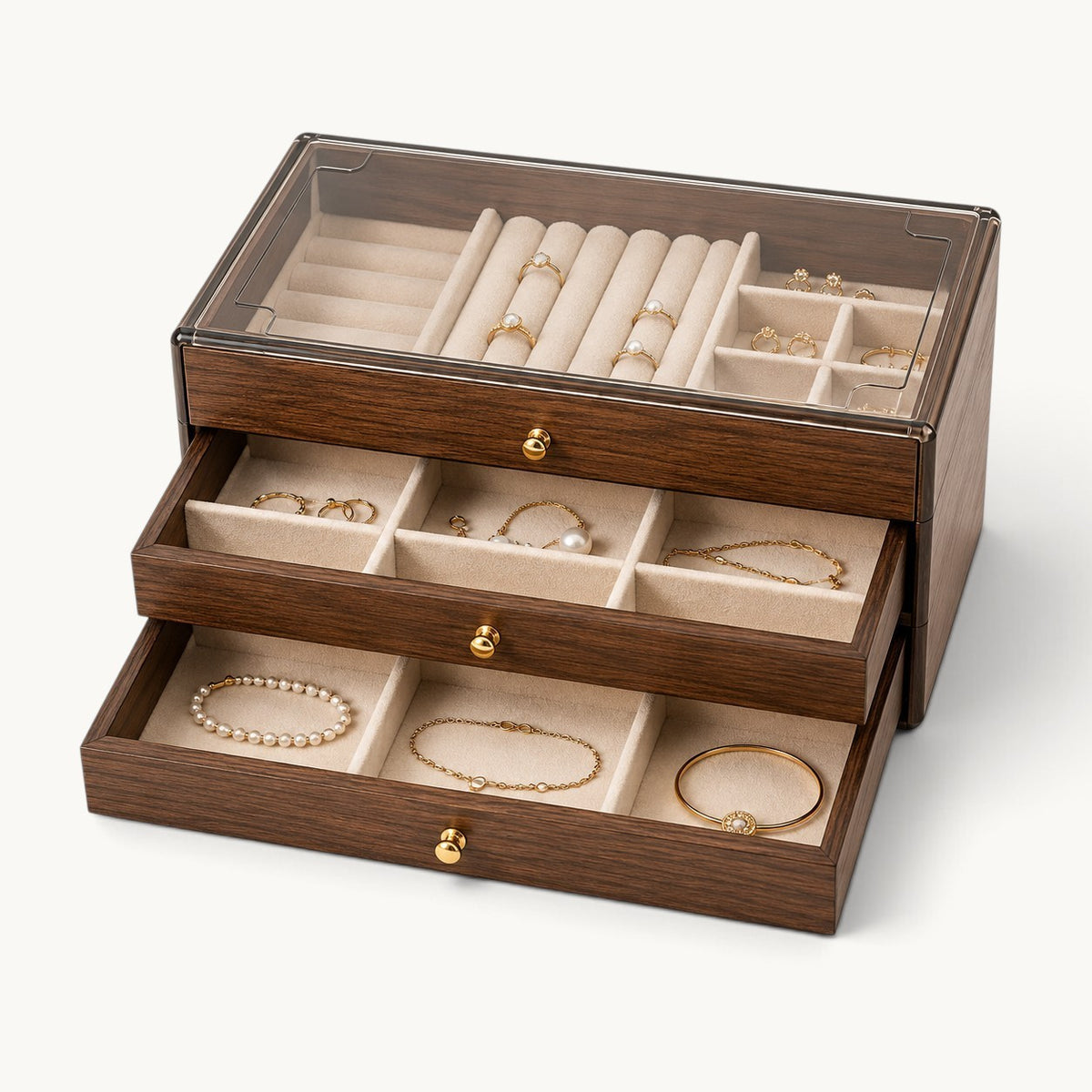 Boîte à bijoux 3 tiroirs en bois de noyer, les trois tiroirs ouverts et garnis de velours crème
