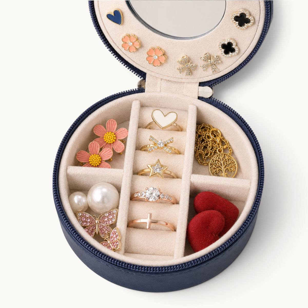 Fond de la boîte à bijoux ronde de voyage, compartiments en quartiers et fentes à bagues en velours
