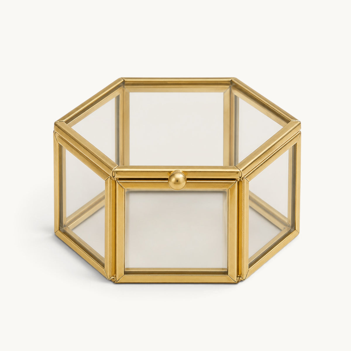 Boîte à bagues hexagonale fermée en verre et métal doré