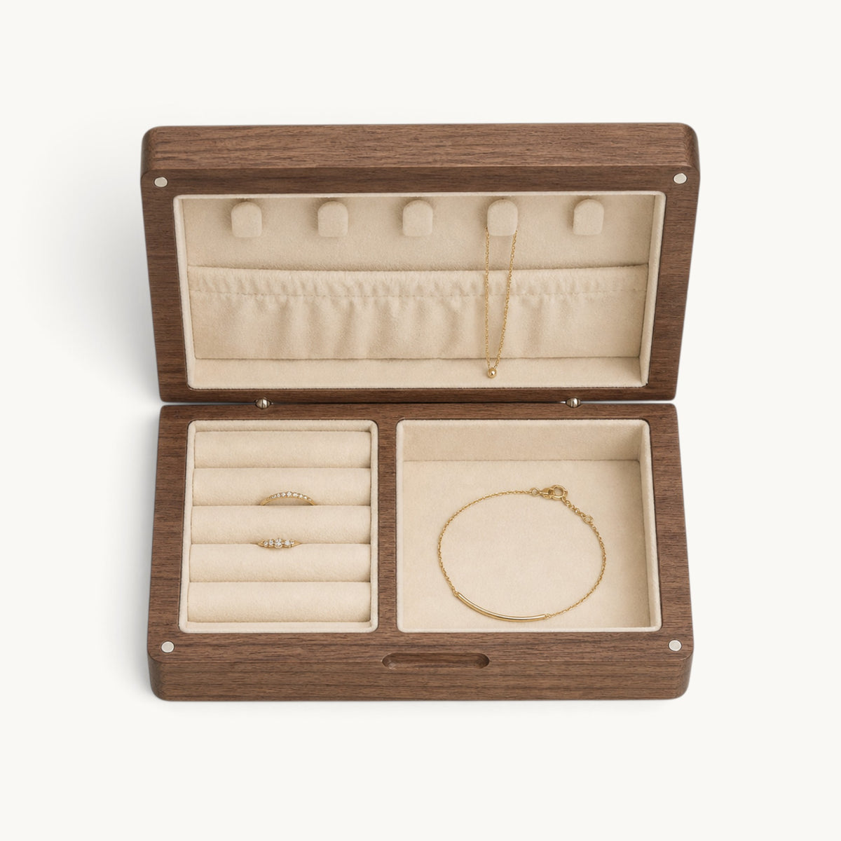 Vue de dessus de la boîte à bijoux en noyer avec rouleaux et compartiments