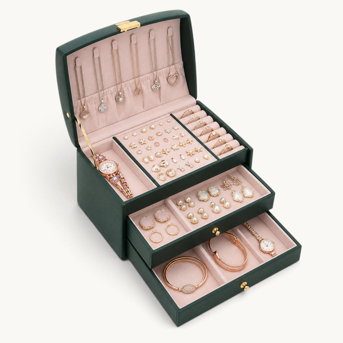 Boîte à bijoux avec serrure vert profond ouverte avec deux tiroirs garnis de bijoux