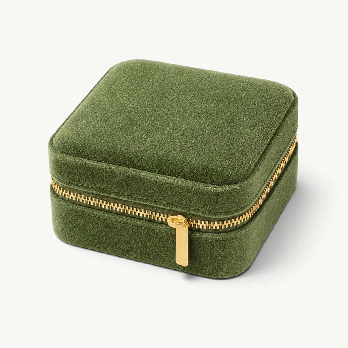 Boîte à bijoux de voyage en velours vert kaki fermée avec fermeture dorée