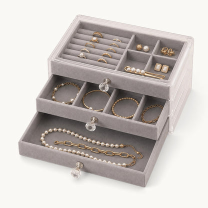 Organisateur de bijoux à tiroirs gris, plateau à rouleaux à bagues et compartiments à droite