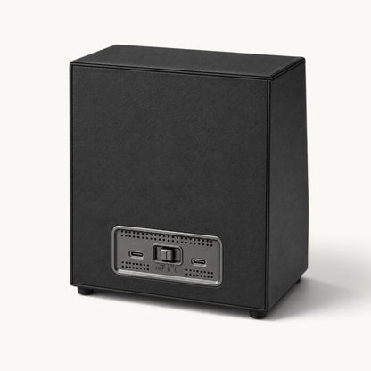 Panneau arrière du remontoir double montre automatique : sélecteur de mode OFF / B / L et deux ports USB-C